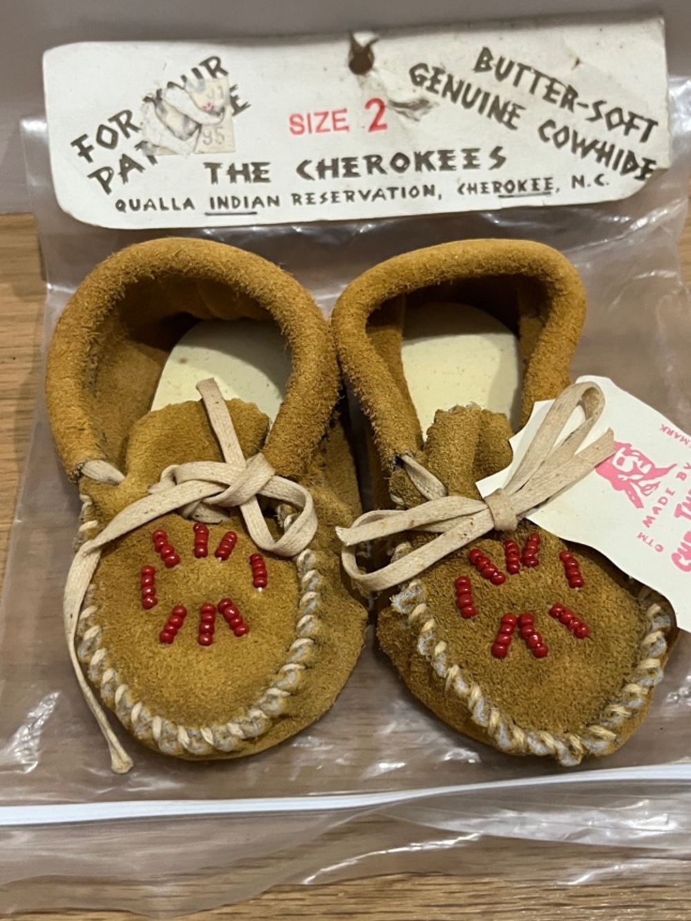 Cherokee Kids Butter-Soft Suede Moccasins in Mustard with Red Bead Detail